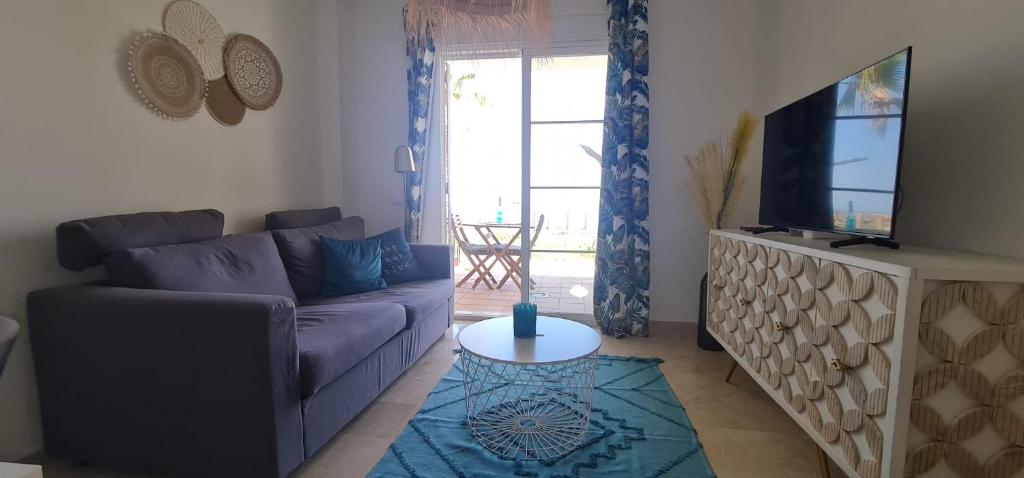 TV a/nebo společenská místnost v ubytování Small Oasis - Appartement 6 personnes