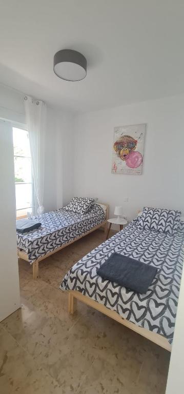 Postel nebo postele na pokoji v ubytování Small Oasis - Appartement 6 personnes