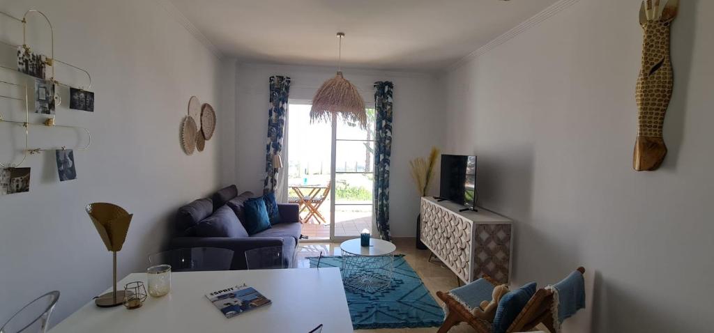 TV a/nebo společenská místnost v ubytování Small Oasis - Appartement 6 personnes