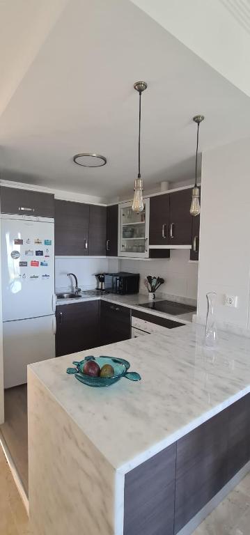 Kuchyň nebo kuchyňský kout v ubytování Small Oasis - Appartement 6 personnes