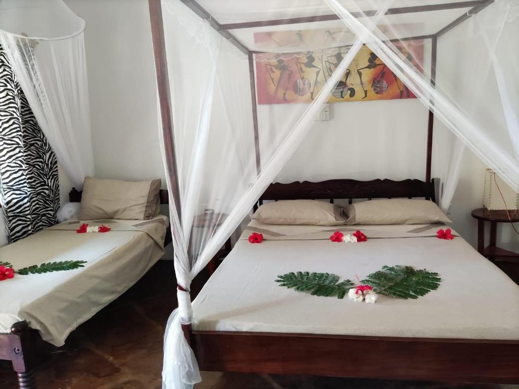 Postel nebo postele na pokoji v ubytování BeB Sardegna2 Anjumasa village
