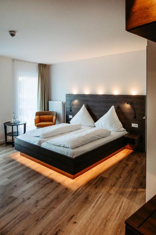 Postel nebo postele na pokoji v ubytování Hotel Bolte