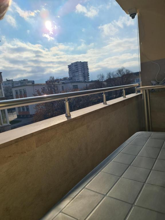 a balcony with a view of a city at Apartment's Ortakchiev 1 in Sofia