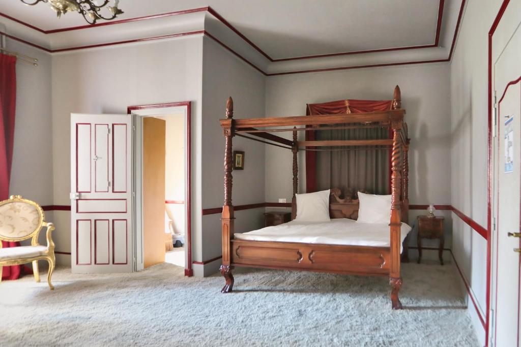 Postel nebo postele na pokoji v ubytování Château de Béguin