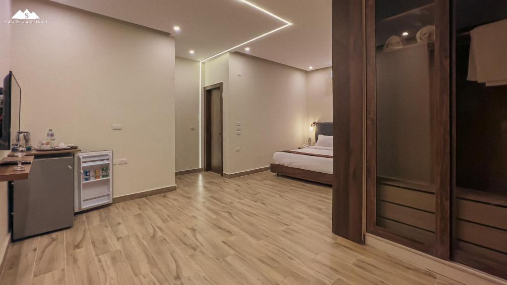 Kuchyň nebo kuchyňský kout v ubytování Sofia Pyramids Hotel