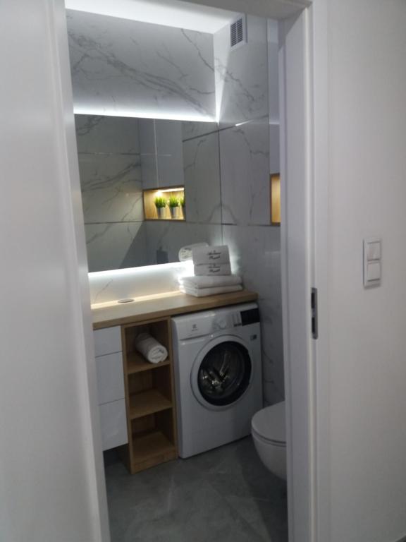 Kúpeľňa v ubytovaní Apartament Przystań z tarasem