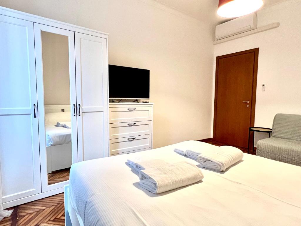A bed or beds in a room at La Dolce Vita - Navigli