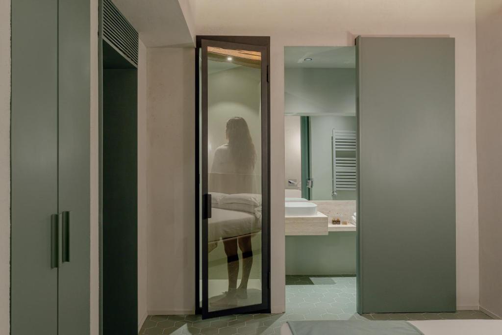 A bathroom at Design apartment with private pool in Campo dei Fiori