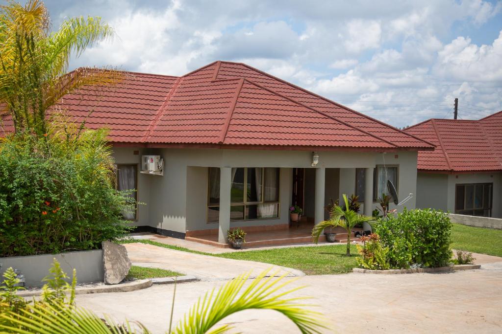 a house with a red roof at Muka Staytel in Ndola