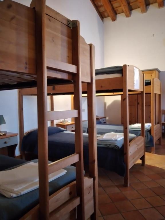 Postel nebo postele na pokoji v ubytování Ostello Europa