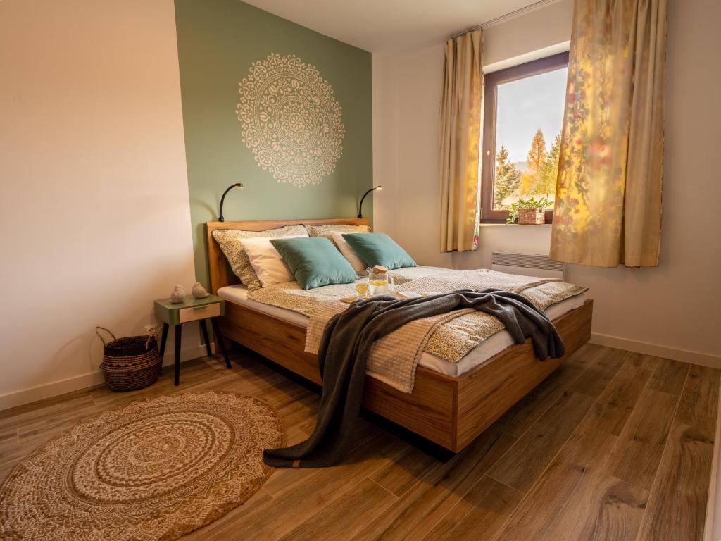 Posteľ alebo postele v izbe v ubytovaní Apartament Sielanka Jaworki