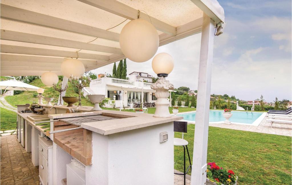 The swimming pool at or close to 2 Bedroom Stunning Home In Roma