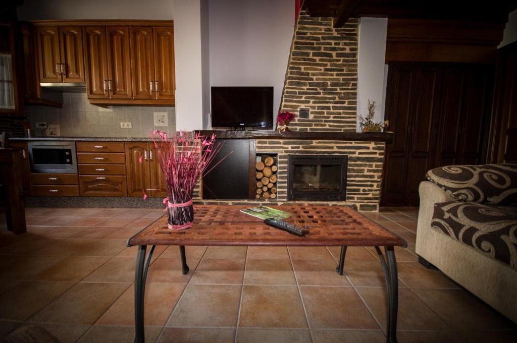 Kuchyň nebo kuchyňský kout v ubytování Apartamentos El Sualleiro
