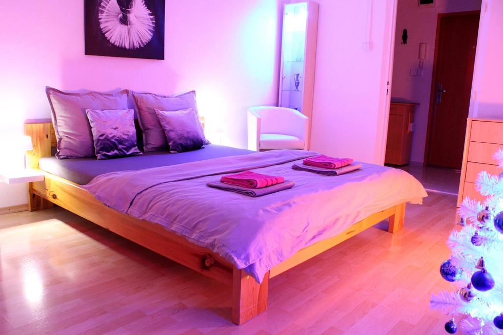 Кровать или кровати в номере Apartment with balcony, Humenné SK