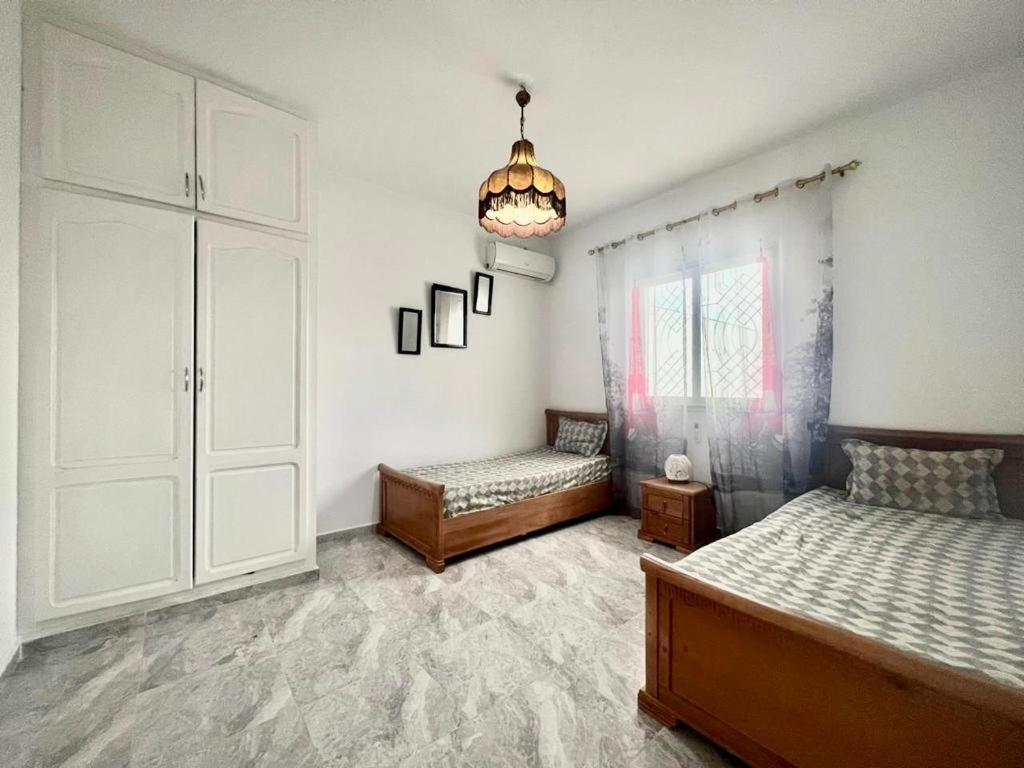 Postel nebo postele na pokoji v ubytování Un emplacement exceptionnel