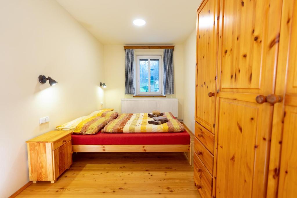 Postel nebo postele na pokoji v ubytování Apartmány Petra
