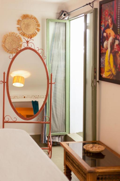 Postel nebo postele na pokoji v ubytování Riad Green Vines