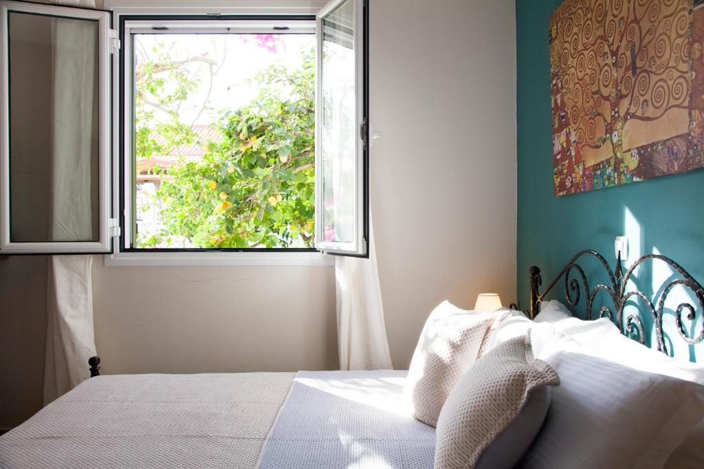 Postel nebo postele na pokoji v ubytování Casa da Bugainvillea