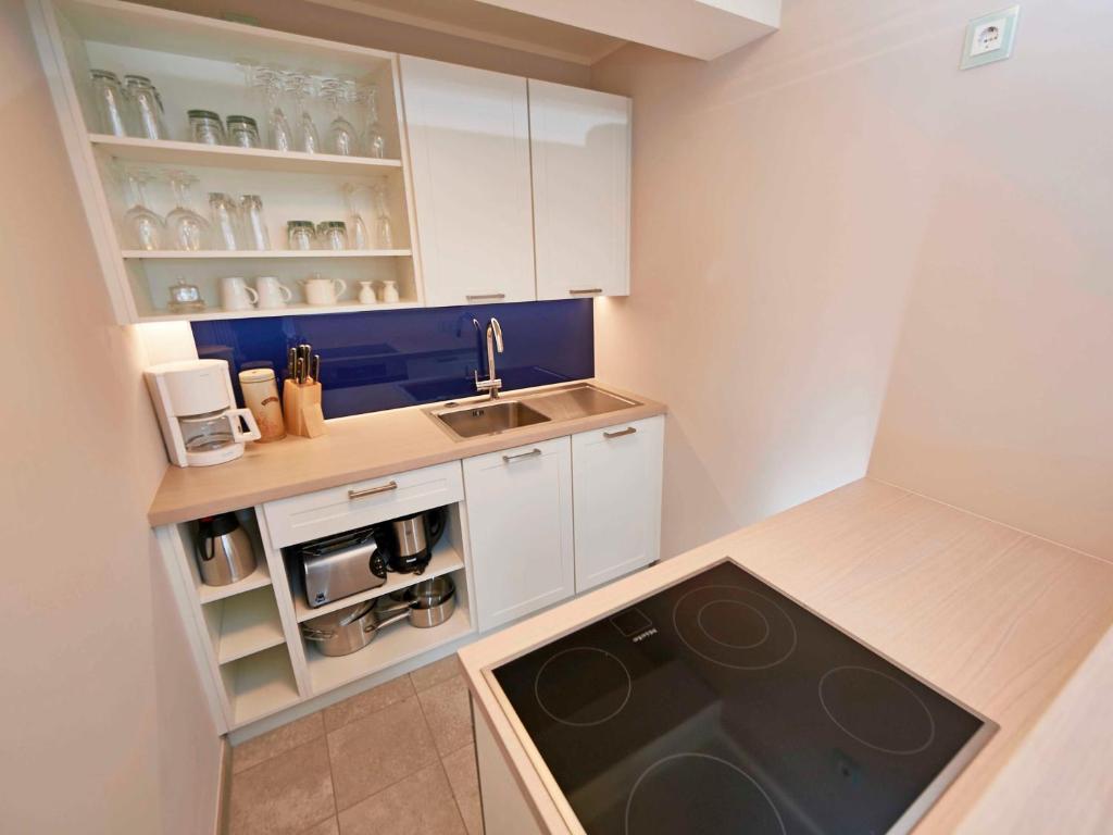 Kuchyň nebo kuchyňský kout v ubytování Strandresort Prora - WG 202 mit Meerblick und Sauna