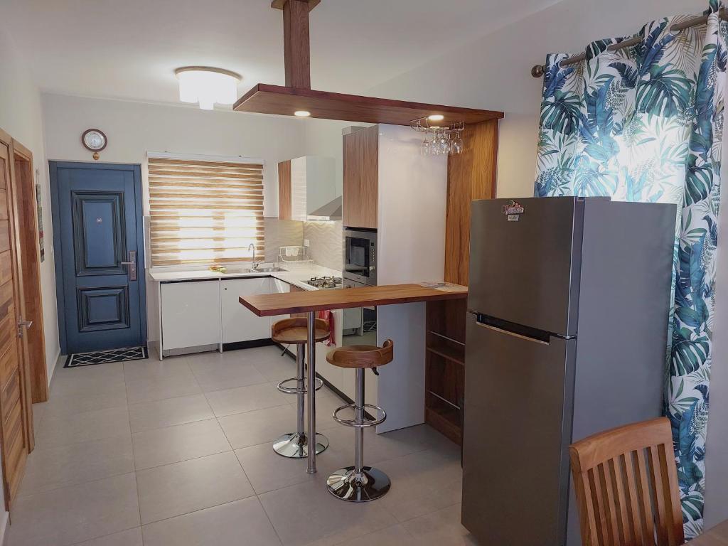Kuchyň nebo kuchyňský kout v ubytování Golden Square Villa & Private Pool