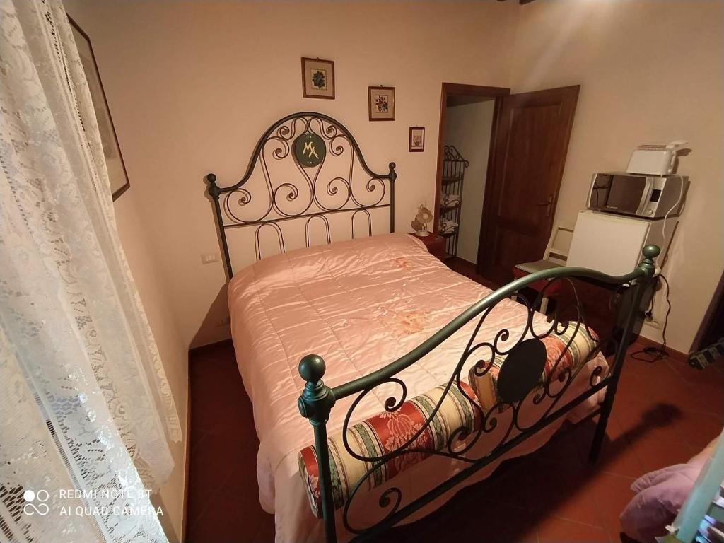 Posteľ alebo postele v izbe v ubytovaní Castelvecchio Alto