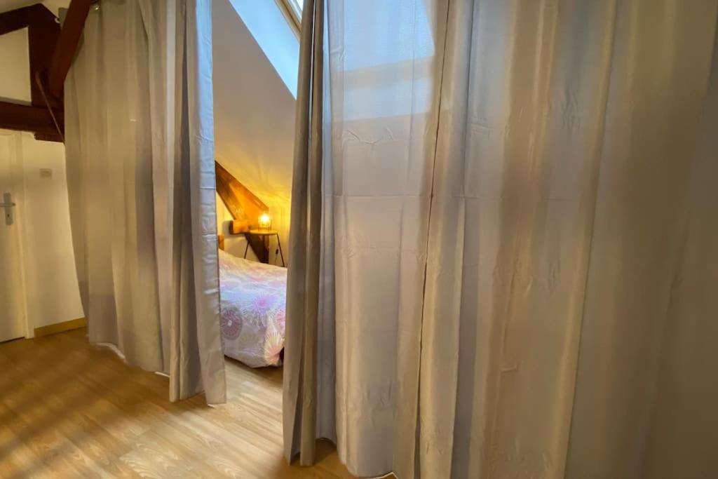 Postel nebo postele na pokoji v ubytování Le Raddon