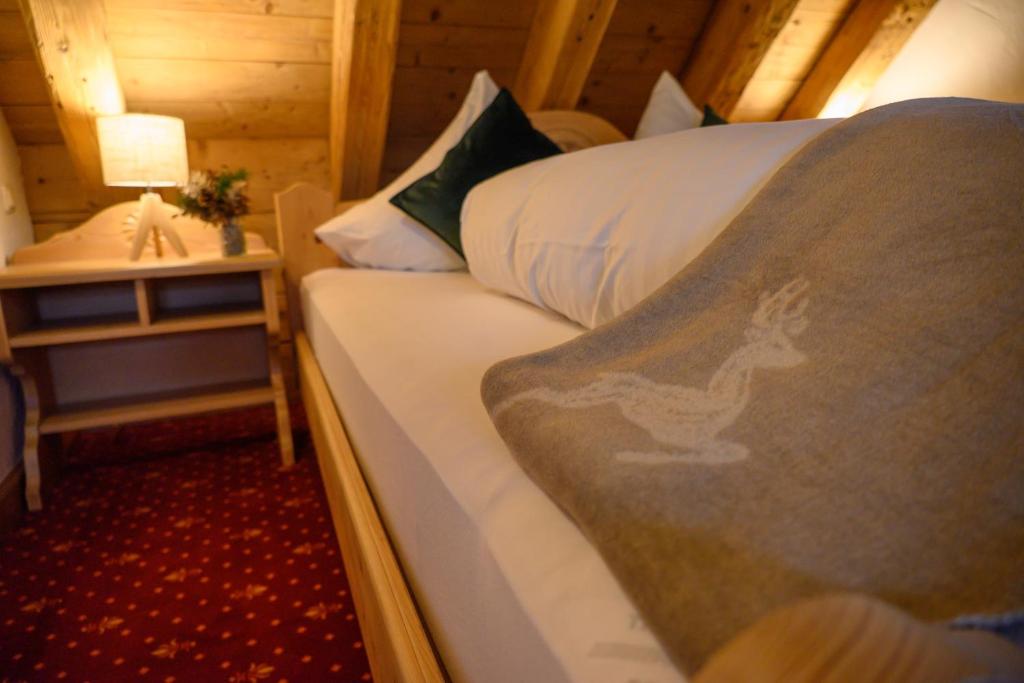 Postel nebo postele na pokoji v ubytování InselMühle