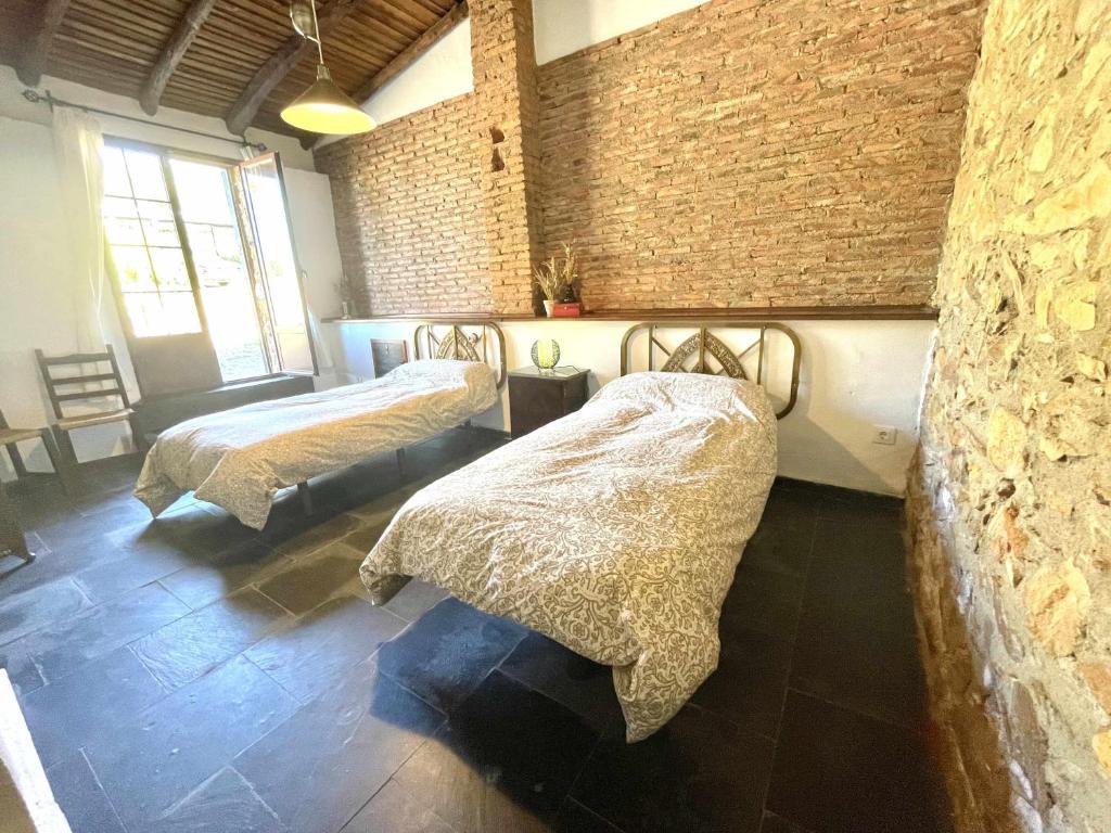 Postel nebo postele na pokoji v ubytování La Alberguería complejo rural