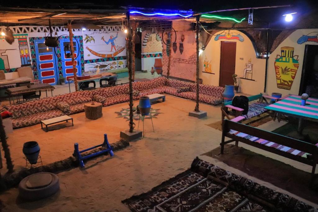 an aerial view of a room with a ping pong table at Carmah Guest house in Aswan
