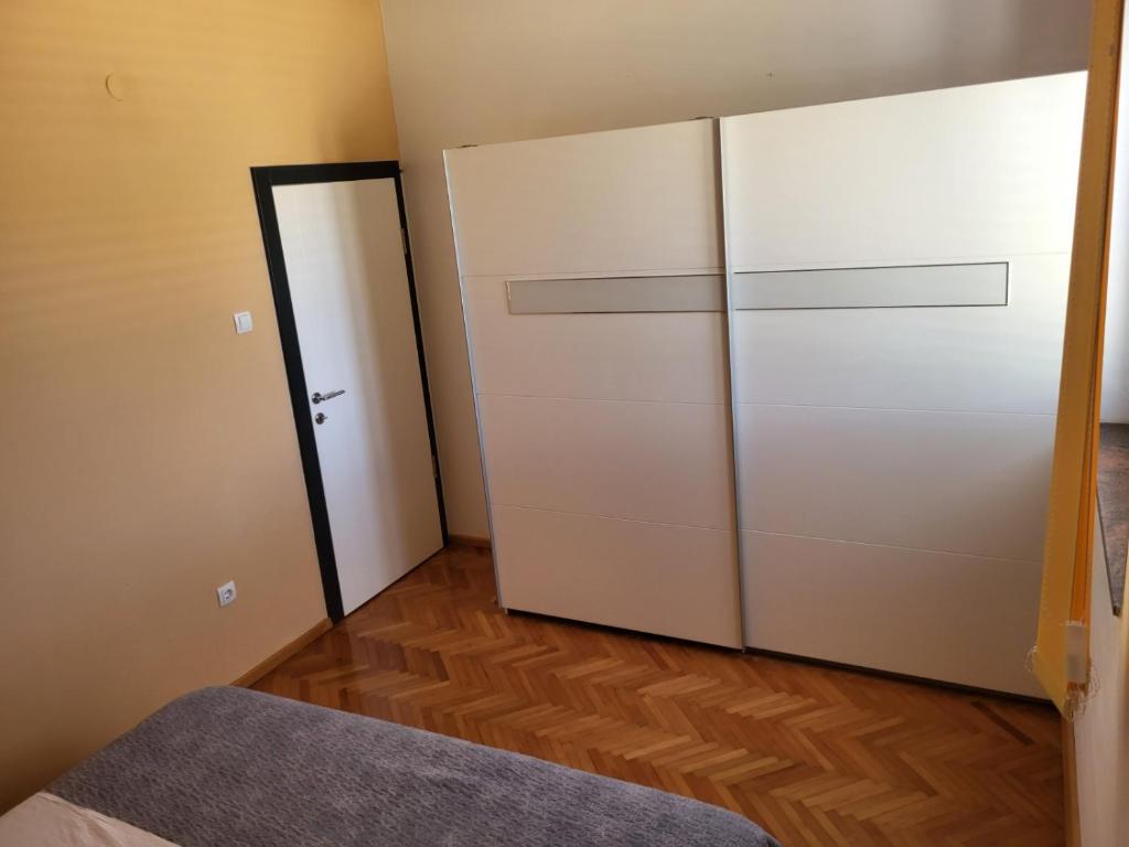 Łóżko lub łóżka w pokoju w obiekcie Apartment in Vrsi with Air conditioning, WIFI, Washing machine, Dishwasher (4836-1)