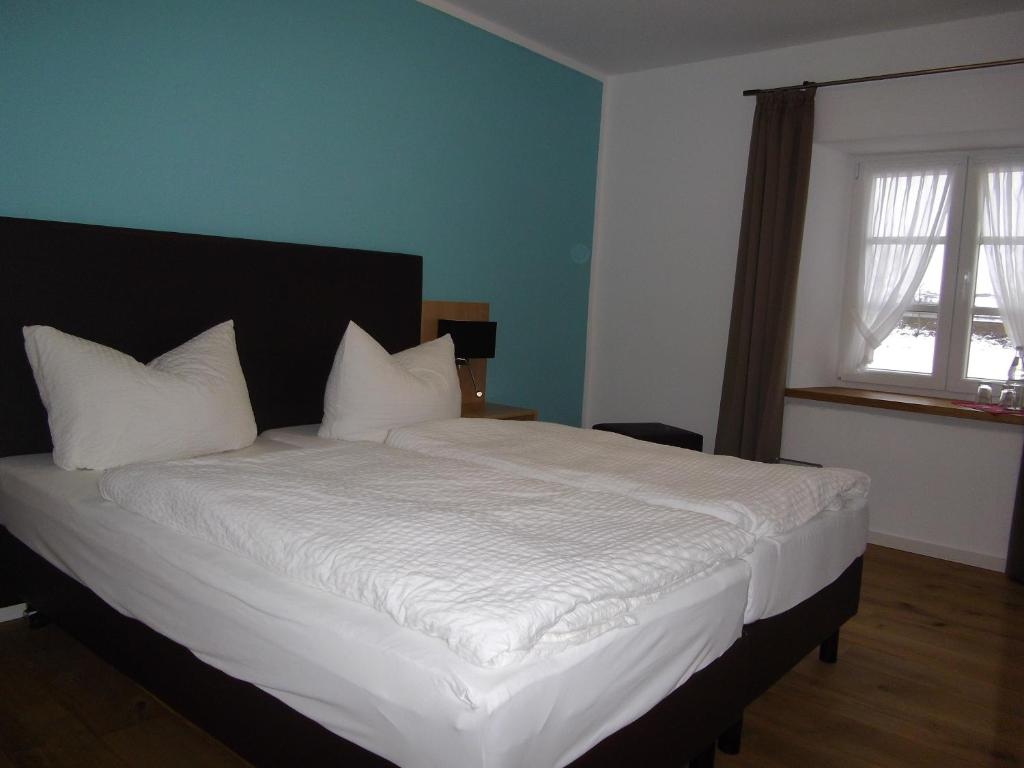 Postel nebo postele na pokoji v ubytování Müllisch's Hof Hotel