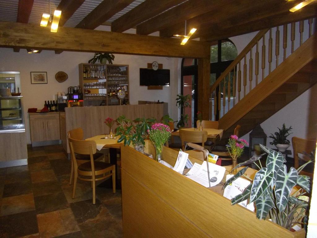 TV a/nebo společenská místnost v ubytování Müllisch's Hof Hotel