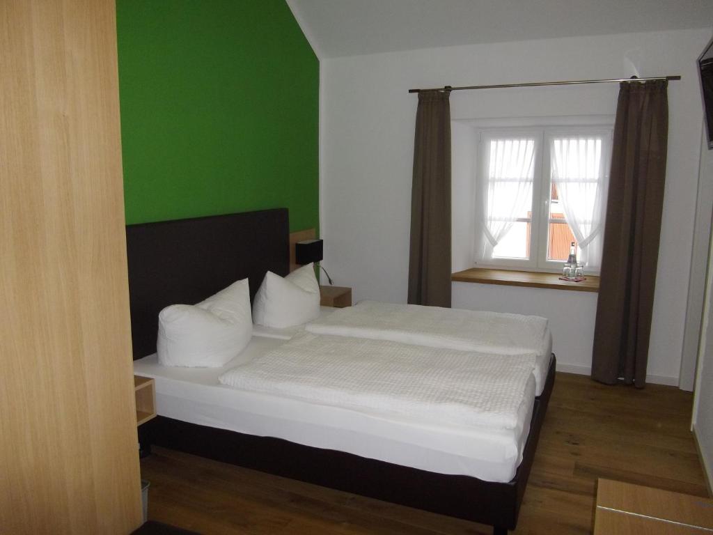 Postel nebo postele na pokoji v ubytování Müllisch's Hof Hotel