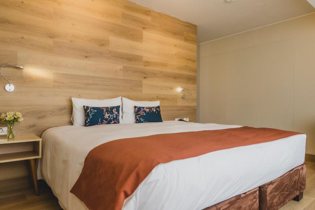 Postel nebo postele na pokoji v ubytování ARTE HOTEL Lima