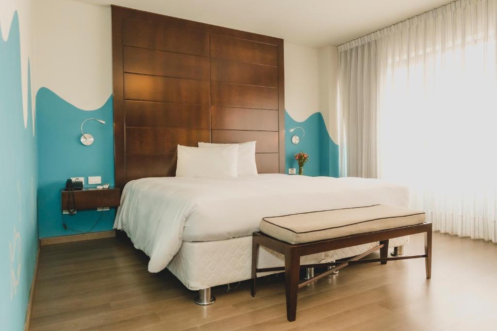 Postel nebo postele na pokoji v ubytování ARTE HOTEL Lima
