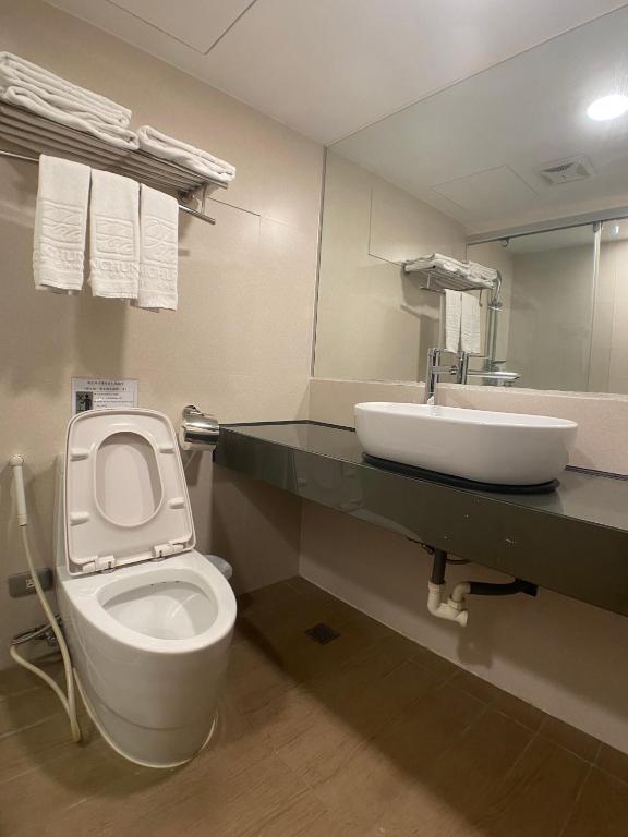 Koupelna v ubytování Bonjour Hotel