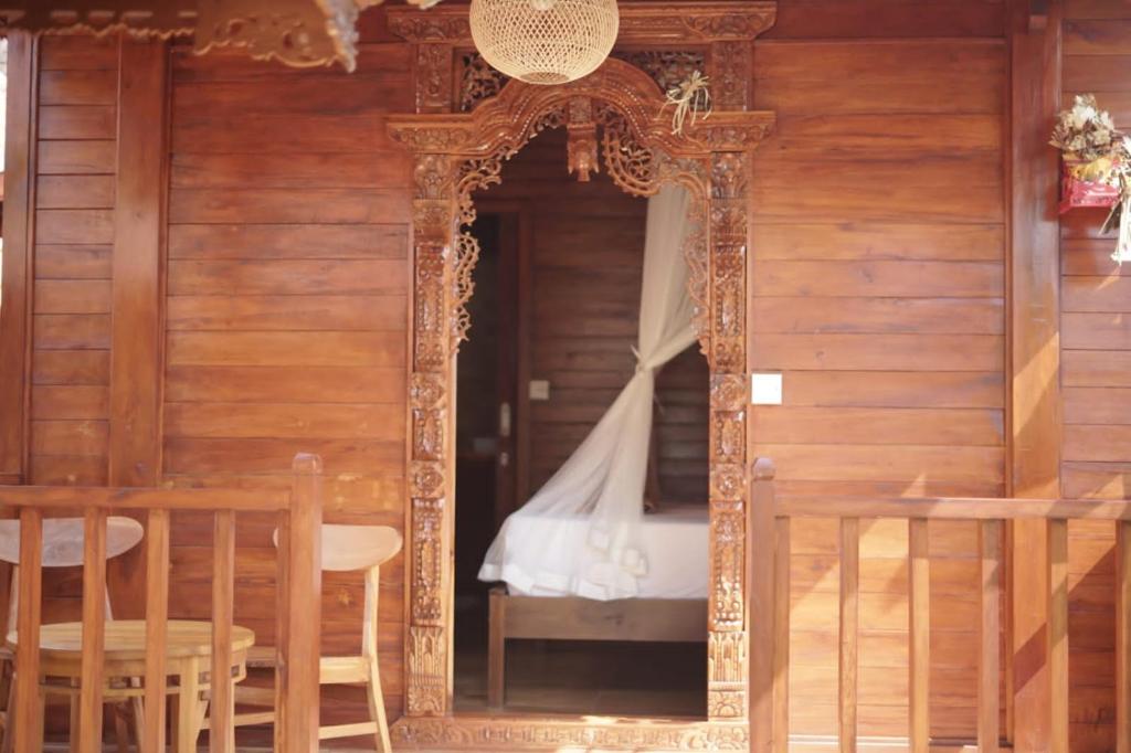 Letto o letti in una camera di Teba Junjungan Cottages
