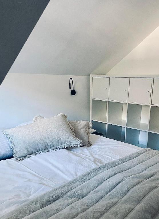 A bed or beds in a room at Chalet Badberg