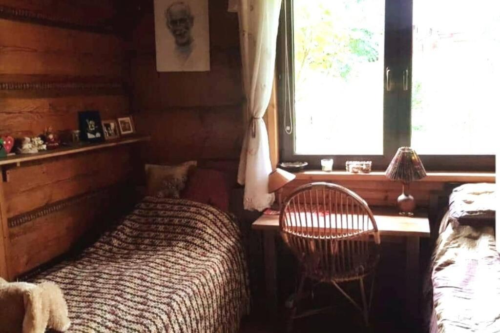 Posteľ alebo postele v izbe v ubytovaní Stara chałupa
