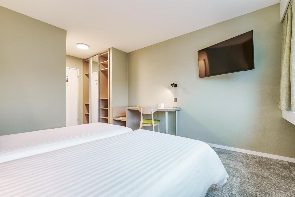 TV a/nebo společenská místnost v ubytování flexymotel Wil