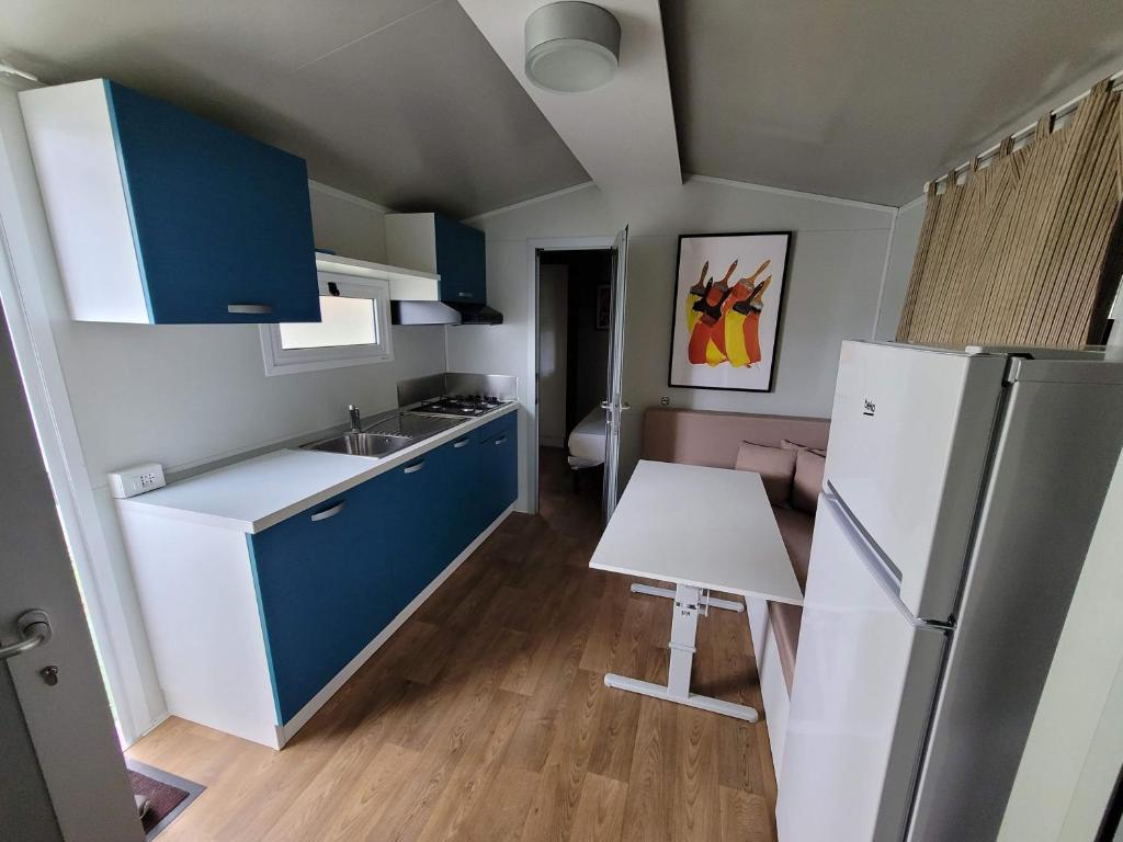 Kuchyň nebo kuchyňský kout v ubytování Camping Pilzone