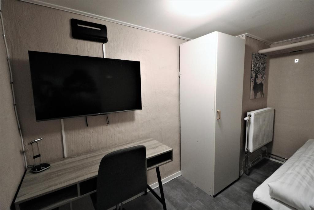 TV a/nebo společenská místnost v ubytování RIBO Apartment Arctic