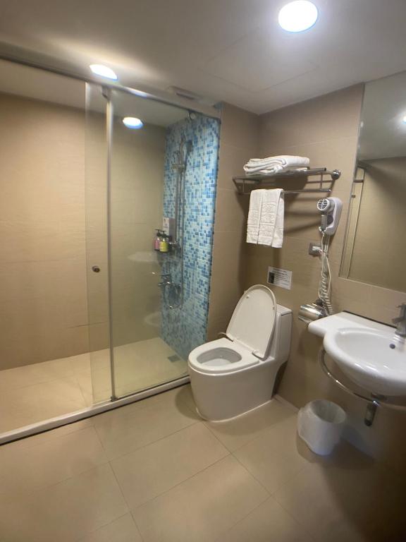 Koupelna v ubytování Bonjour Hotel