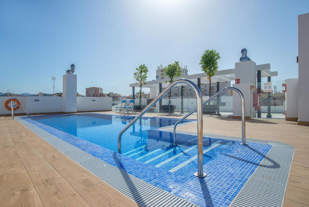 The swimming pool at or close to SOUL Malaga City Apartment