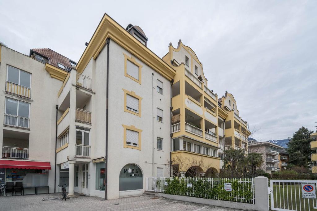 an apartment building in a city at Appartement Laurin in Merano