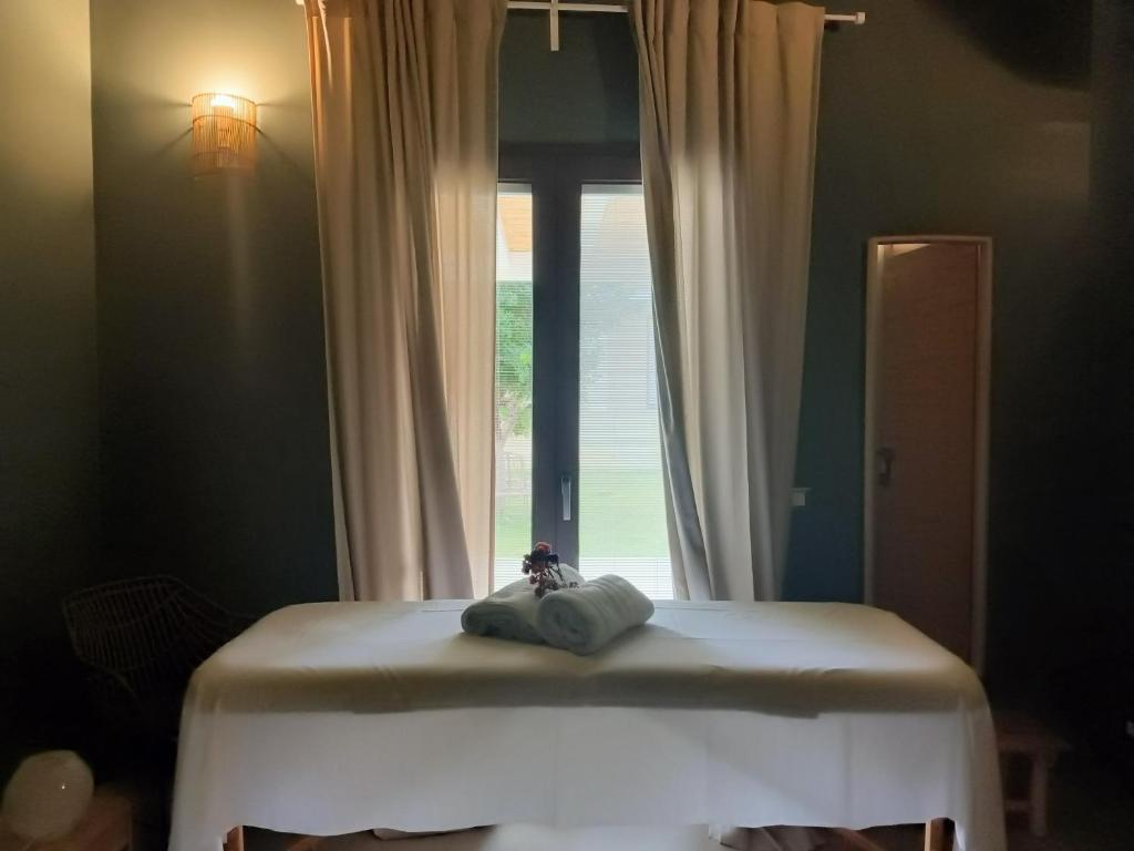 Postel nebo postele na pokoji v ubytování B&B Giardinello