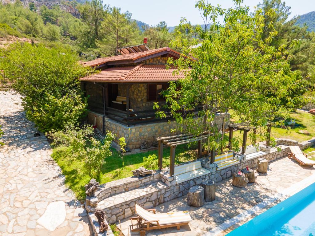 an aerial view of a house with a pool at Sakin Vadi Villas in Marmaris