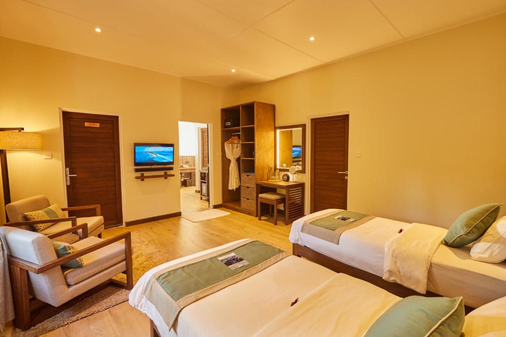 TV a/nebo společenská místnost v ubytování Kuredu Island Resort & Spa