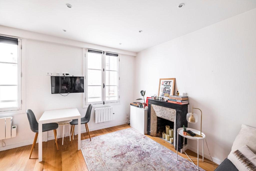Televízia a/alebo spoločenská miestnosť v ubytovaní Ciseaux 4G - SAINT GERMAIN DES PRÈS - Best Location