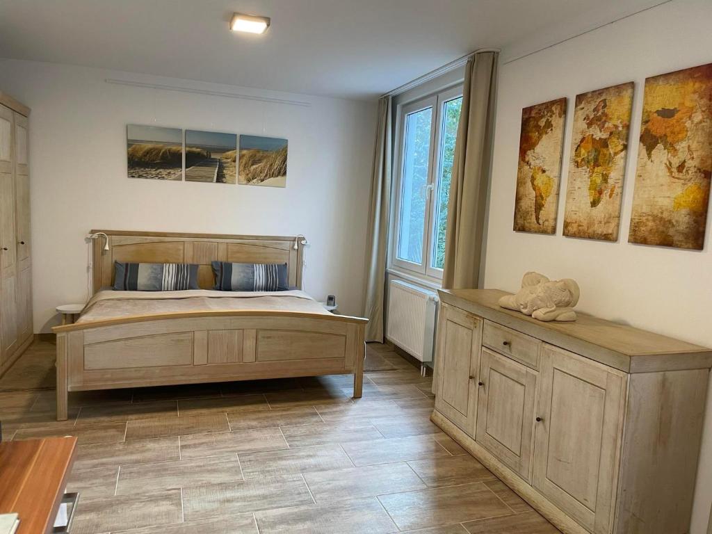 Postel nebo postele na pokoji v ubytování Tolles Apartment in idyllischer ruhiger Lage